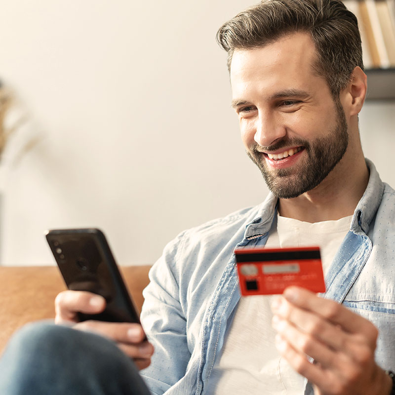 man ordering commissary with cell phone